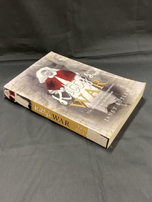 Olive green paperback cover. The spine shows the title in black and white print with an image of a nurse at the top. The front cover has a full page image of a woman in a white nurse's uniform with red cape and the title overlaid over the top.