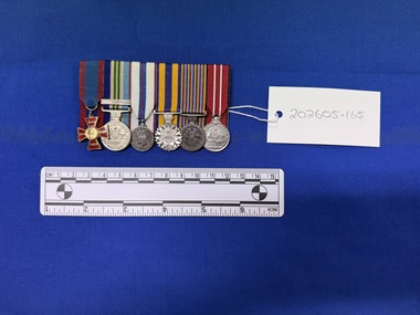 Medal - Court-mounted set of miniature medals: Royal Red Cross, Australian Service Medal 1945-75 with PNG clasp, Elizabeth II Silver Jubilee Medal 1977, Defence Force Service Medal, National Medal and Australian Defence Medal, [unknown]