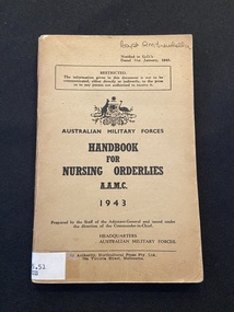 Staple-bound booklet with light brown cover with black print. Spine label taped to base of spine.
