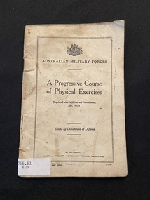 Small staple-bound booklet with a cream cover displaying a black double-line border on the front cover containing text printed in black. There is a white spine label attached to the base of the spine.