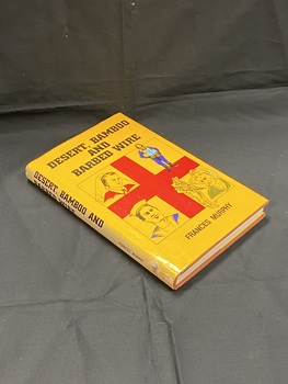 Brown hard-cover book with a yellow dust-jacket. Title printed in black down the spine. Front cover shows title printed in black at the top, author printed at the bottom. In the middle is a square outlined with a thin black line, inside is a large red cross, in each corner of the cross is a drawing. The top left drawing is of a nurse, top right is an airforce member, bottom left is a navy person, and bottom right are two army men.