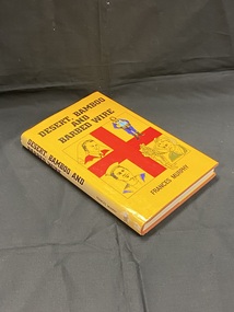 Brown hard-cover book with a yellow dust-jacket. Title printed in black down the spine. Front cover shows title printed in black at the top, author printed at the bottom. In the middle is a square outlined with a thin black line, inside is a large red cross, in each corner of the cross is a drawing. The top left drawing is of a nurse, top right is an airforce member, bottom left is a navy person, and bottom right are two army men.