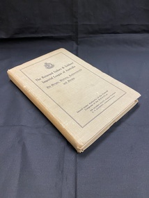 Faded green hardcover book. The front cover has a doulble-line black border with the R.S.L. emblem and title printed below in black text.
