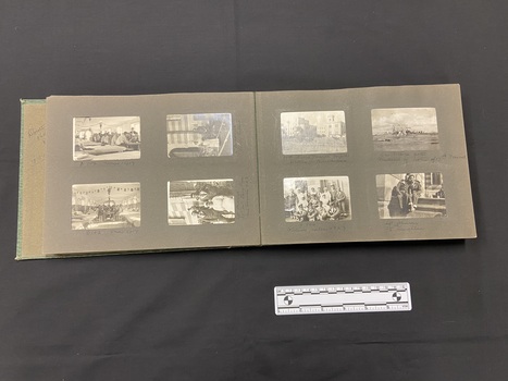 An example of the inside layout showing four evenly spaced black and white photos on each page with handwritten captions.