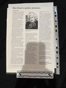 Photocopy of a newsletter page with a single article of three columns of text with the centre column headed by a portrait photograph of an elderly woman wearing a dark top with a patterned scarf around her neck, her hair is white.