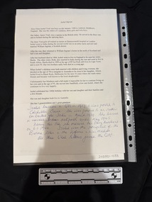 Single sheet of paper with text on one side, the upper 2/3 of the page is printed text and below is handwriting in blue ink.