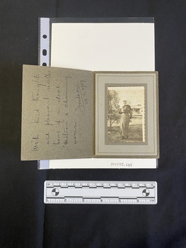 A small black and white photo inside a card.