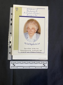 Folded and stapled A5 booklet printed on pale paper, consisting of photos, text and pictures. This booklet is a colour print.  Text outlines the order of service.