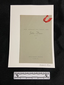 Single-fold grey card with rough cut edging. Black printed text. Double-line header and footer on both inside pages. Decorative red ribbon attached to top right corner of the cover.
