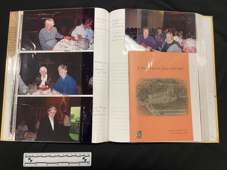 Open layout of inside pages showing three coloured photos down the left page and one coloured photo and an orange paper booklet down the right, with annotations on the inner margins.