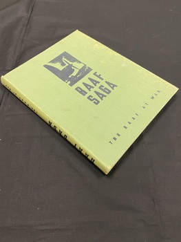 Cloth bound hardback book with faded green cover. Title printed in black print on cover and spine. Image of the outline of a plane propeller in the top centre of cover.