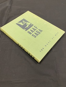Cloth bound hardback book with faded green cover. Title printed in black print on cover and spine. Image of the outline of a plane propeller in the top centre of cover.