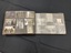 The inside pages are black card separated by protective translucent pages.  This layout shows 7 photos on the left with handwritten annotations and 4 photos on the right with annotations beneath the translucent paper.