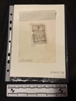 A small newspaper clipping of a death notice