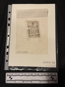 A small newspaper clipping of a death notice