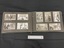Inside page layout showing black and white photos glued on to black card pages and bound through two holes with elastic.