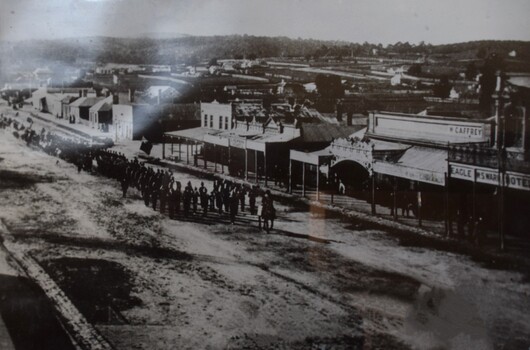 Copy of photograph showing a procession in Warrenheip Street c. 1900.