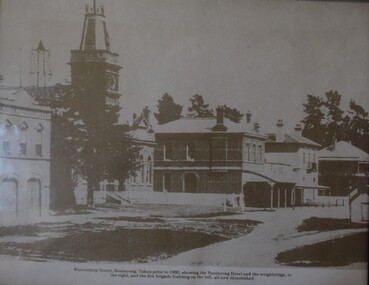 Copy of photographic view of Fire Brigade, weighbridge, Town Hall, Shops and Buninyong Hotel, Buninyong, pre. 1930s.
