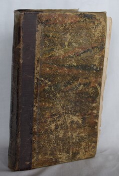 Hard cover bound copy of The Pilgrim's Progress by John Bunyan. This edition published in 1836.