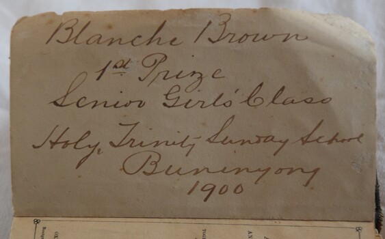 Inscription made out to Blanche Brown, a member of Buninyong Holy Trinity Sunday School in 1900. Located inside the cover of a Book of Common Prayer, Hymns Ancient and Modern.