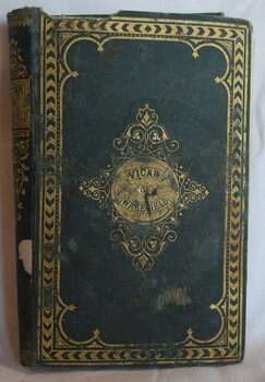 Hard cover, cloth bound book entitled The Vicar of Wakefield, by Dr. Goldsmith.