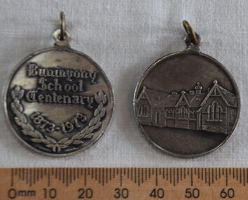 Silver coloured medallion to mark the centenary of Buninyong Primary School in 1973.