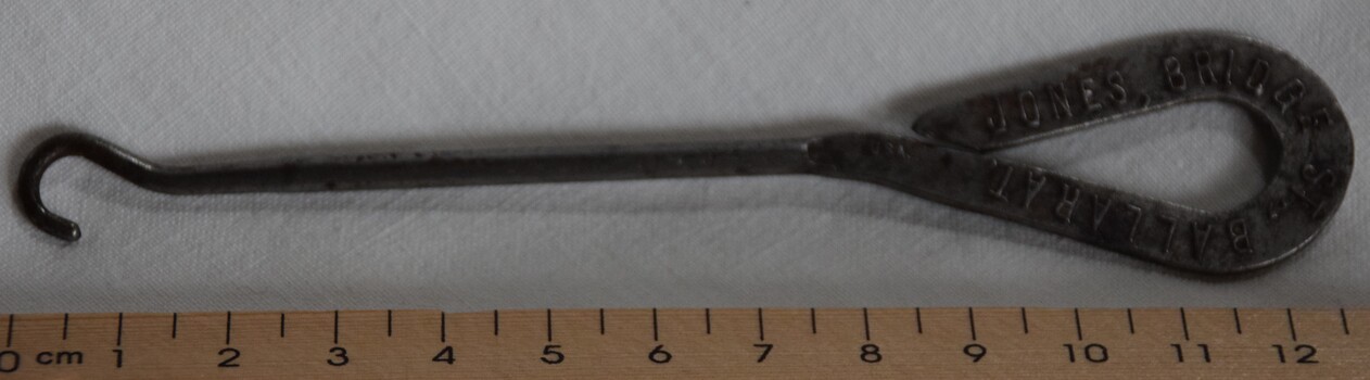 Metal button Hook sold by Jones, Bridge Street, Ballarat.