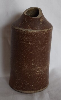 A brown glazed pottery bottle, c. 19th C. Made by K. Evans, Nottingham.