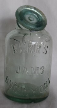 Broken glass jar with lid produced for Kerr's James, Buninyong. 