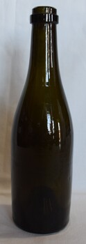 Green glass bottle.