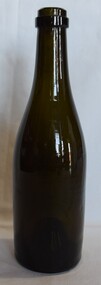 Green glass bottle.