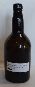 Dark green goldfield's beer bottle dug up near Buninyong in 1991. 