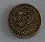 A 1955 Australian shilling coin.