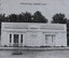 Image of the Old Buninyong Library, possibly in the 20th Century after it was no longer a library. Note that building signage has been removed and building has been painted white.  