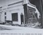 Image showing sections of cladding and weatherboards on the north wall and corner of the facade removed for replacement or repair. 1980s.