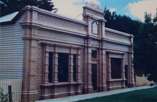 Folder containing photographs and historical text concerning the old Buninyong Library. Cover image shown was taken after the 1890s restoration of the building.