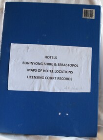 Folder with notes, articles, maps and images of hotels.
