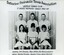 Group of tennis players holding racquets