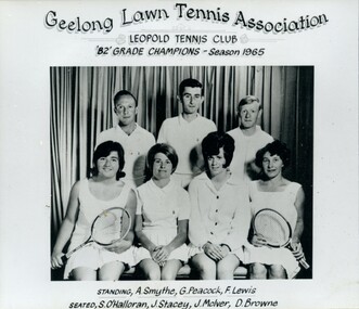 Group of tennis players holding racquets