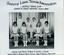 Group of tennis players, some holding racquets