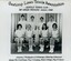 Group of tennis players, some holding racquets