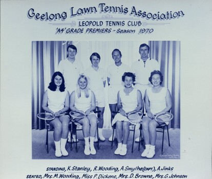 Group of players holding racquets.