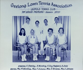 Group of players holding racquets.