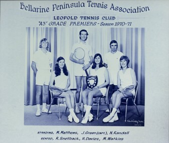 Group of players holding racquets.