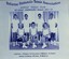 Group of tennis players holding racquets.