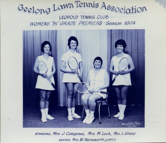 Group of tennis players holding racquets