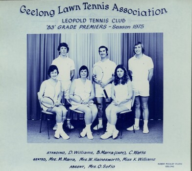 Winning divisional tennis team with racquets