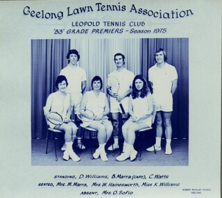 Winning divisional tennis team with racquets