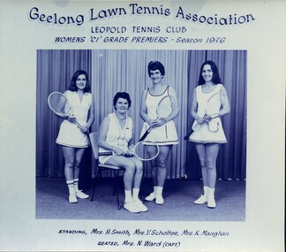 Winning divisional team with tennis racquets