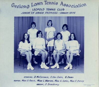 Winning divisional team with tennis racquets